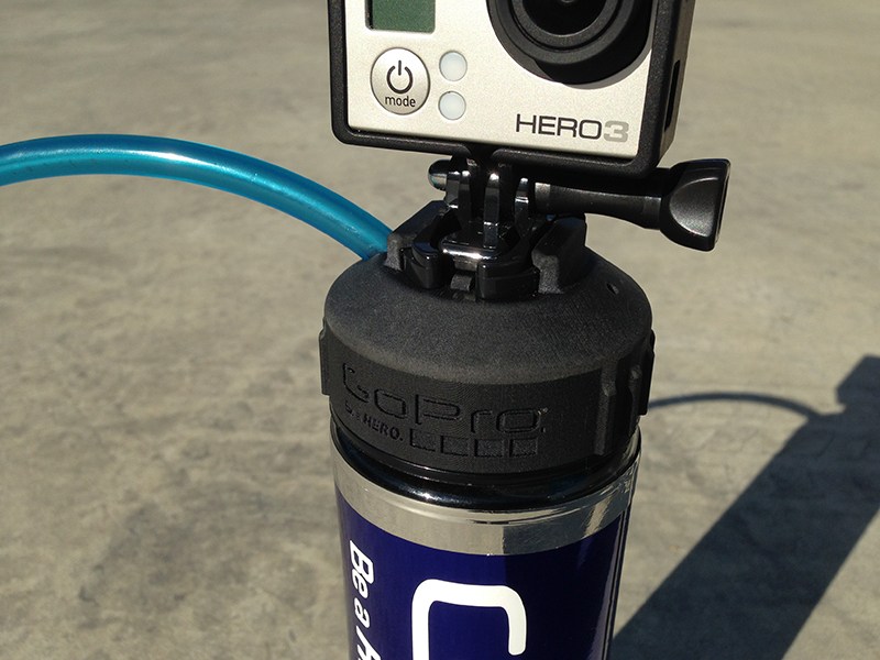 Detail showing standard clip in GoPro mount and branding